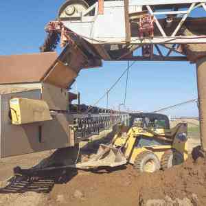 Controlling Carryback At Conveyor Transfer Points